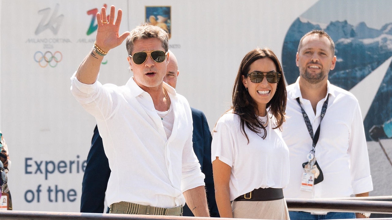 Brad Pitt and girlfriend Ines de Ramon beam as they coordinate in white outfits at the Venice Film Festival.