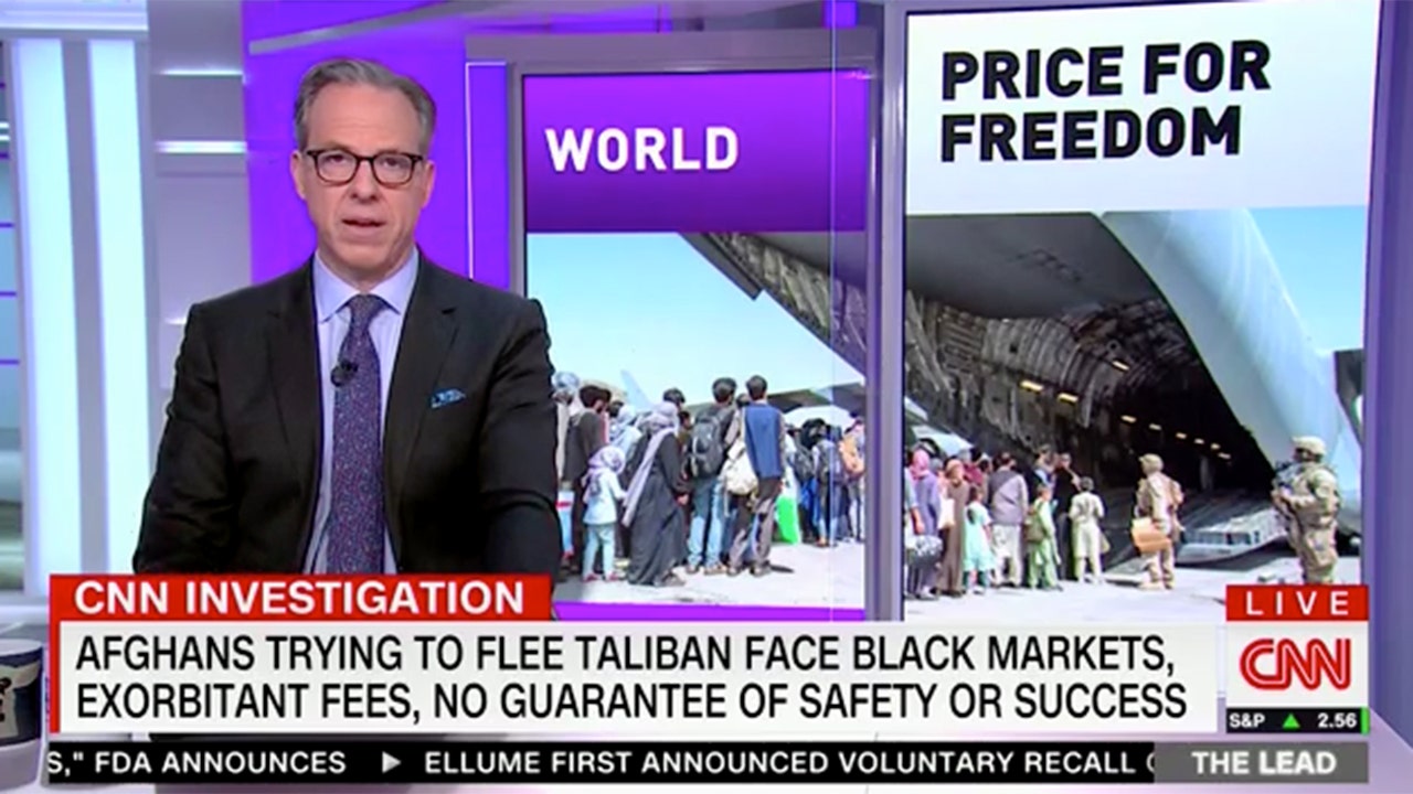 CNN editor stands firm on accuracy of 'black market' report despite network's apology.