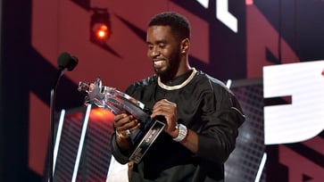 Diddy and an unidentified celebrity were accused of sexually assaulting a victim at an awards show party, allegedly treating her as a "party favor."