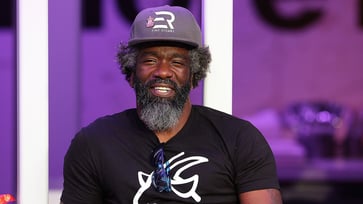 Ed Reed, a Hall of Famer and Ravens legend, accepts a coaching position at an Atlanta-area high school in a surprising move.