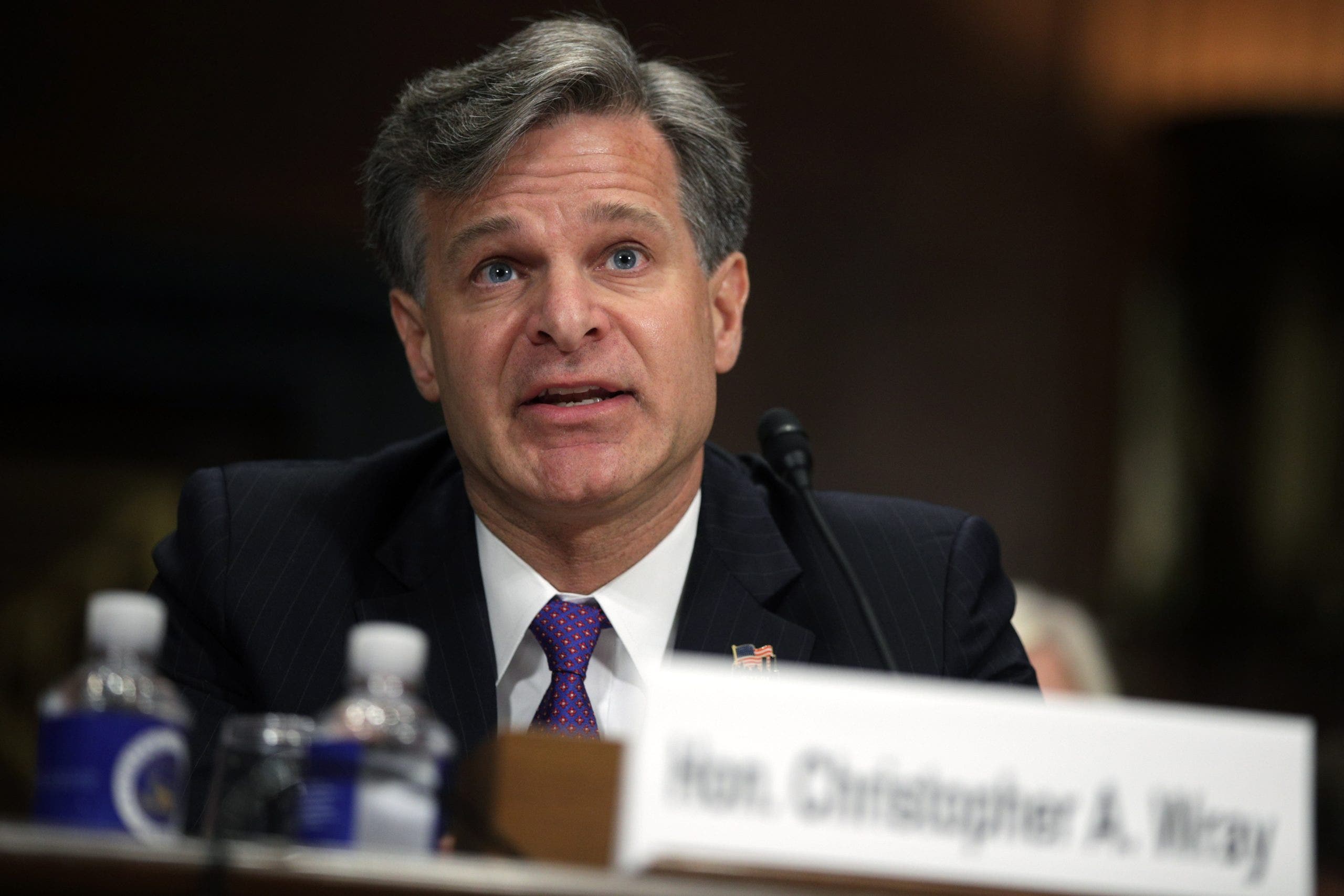 FBI Director Wray announces his resignation during a 'perilous period'.