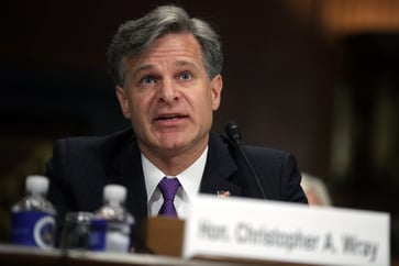 FBI Director Wray announces his resignation during a 'perilous period'.