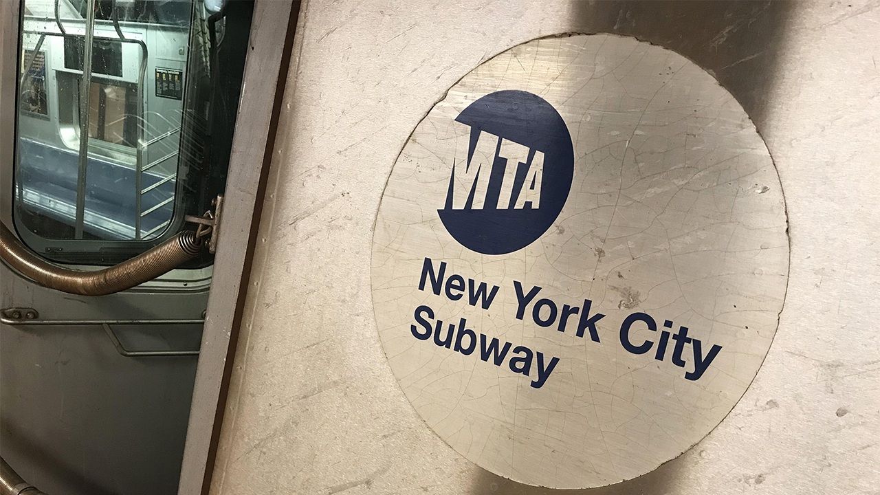 An NYC man was arrested for attempted murder after pushing a commuter onto the subway tracks.