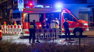 A Syrian refugee has been identified as a suspect in a German terror attack, prompting the chancellor to pledge stricter immigration policies.