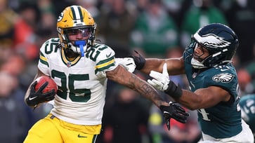 Keisean Nixon of the Packers challenges the early fumble call in the wild-card round game, claiming the Eagles should have been penalized.