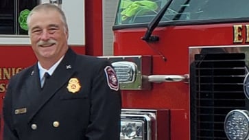 An Alabama police officer shot and killed a Georgia fire chief who had stopped to assist a driver who struck a deer.