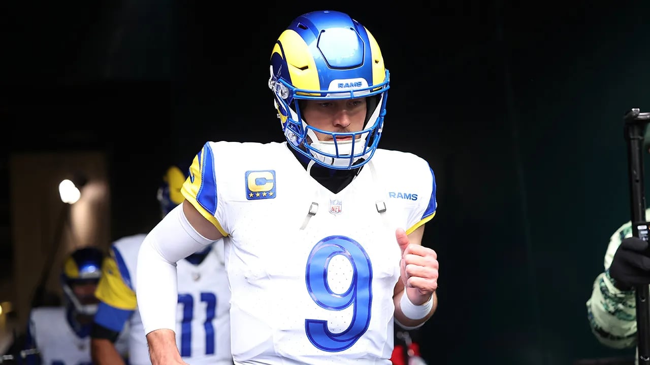 Rams quarterback played through significant rib injury in playoff loss, reveals Matthew Stafford's wife.