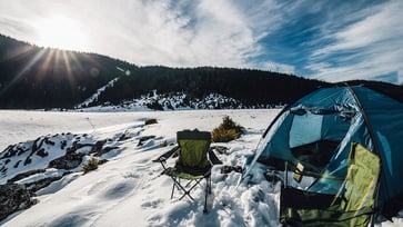 Gear for winter camping to keep you warm while in the woods.