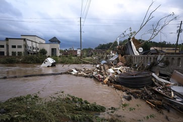 Residents of Asheville grappling with 'catastrophic' aftermath of Hurricane Helene following devastating floods and landslides