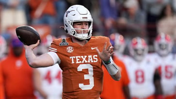 Quinn Ewers of Texas is concentrating on the College Football Playoff semifinal rather than considering his personal future.