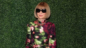 Anna Wintour, Vogue's editor-in-chief, reveals the reason behind her decision to keep wearing sunglasses on set.