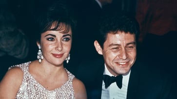 Elizabeth Taylor's husband Eddie Fisher threatened her with a gun, saying, "Too pretty to shoot."