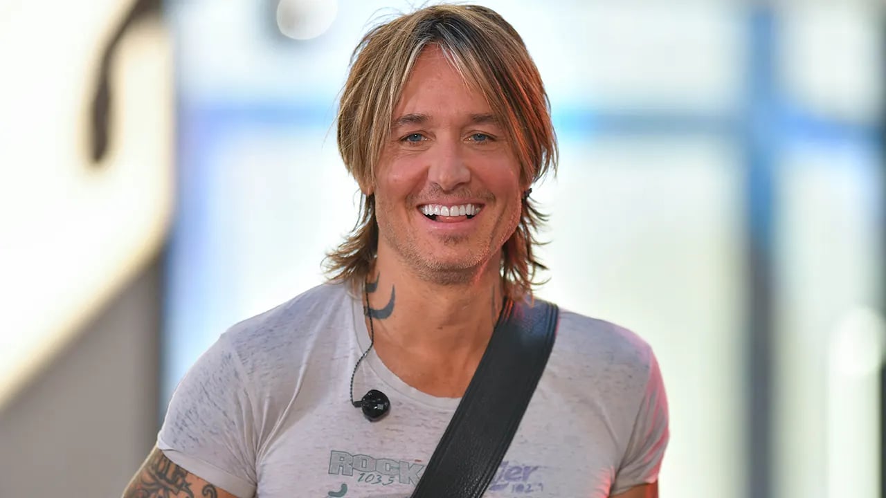 Keith Urban experiences a memorable 'rock n roll' moment when a fan throws her prosthetic leg on stage.