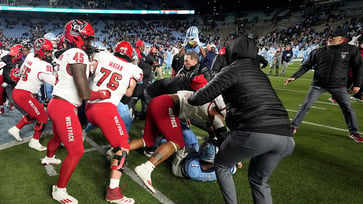 The rivalry between Michigan and Ohio State has led to an increase in full-team melees following their brawl.