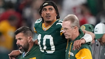 Report suggests Jordan Love of the Packers may have avoided ACL injury, but further tests are needed.