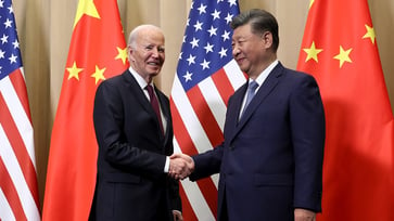 During a meeting with Biden, Xi pledges to cooperate with Trump.