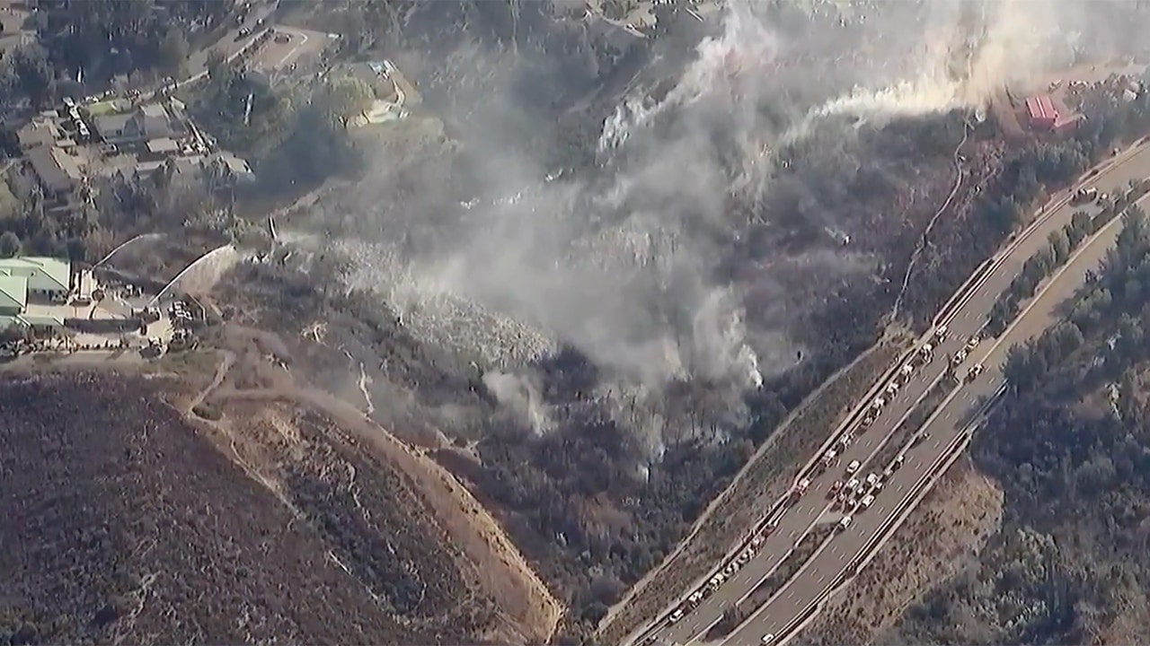 Homes near San Diego are under threat from a brush fire, prompting evacuations of residents.