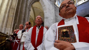 During Mass, a priest was stabbed in the face, amidst a surge of religion-based hate crimes globally.