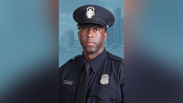 A Detroit police officer was killed in a hit-and-run crash, and the suspect is currently on the run.