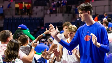 In an epic video, Florida's 7-foot-9 center confronts Shaq: "Don't pick on someone your own size"