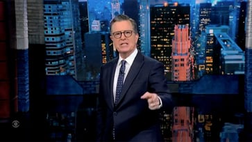 Stephen Colbert criticizes ABC for settling with Trump.