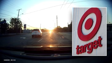 Video footage of an 8-year-old girl driving a family SUV on a Target run