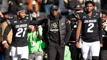 Deion Sanders and his ex-wife were at odds during a senior day celebration for their sons Shedeur and Shilo, causing a rift that felt like "WWIII."