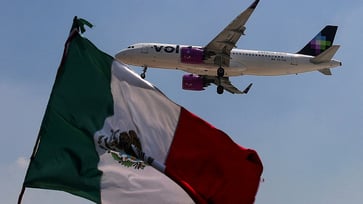 A passenger on a Volaris flight in Mexico was apprehended after being accused of attempting to steer the aircraft towards the US.