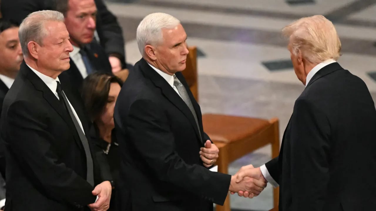 Trump and Pence meet for the first time since leaving office at Carter's funeral.