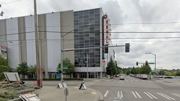 After a man with a gun threatened to shoot everyone, Seattle moviegoers rush out in panic.