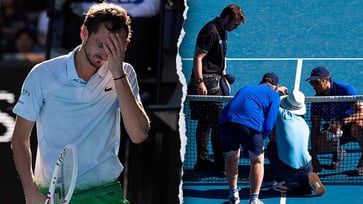 Daniil Medvedev explodes in anger, shattering racket and camera during intense meltdown to escape Australian Open upset.