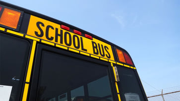 A Phoenix juvenile was apprehended following accusations of pointing a firearm at a school bus filled with students.