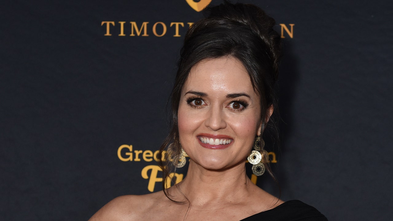 Two years after discovering her faith, Danica McKellar hopes the world would embrace 'God's love.'