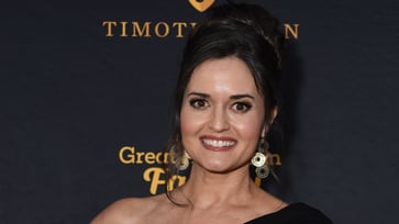 Two years after discovering her faith, Danica McKellar hopes the world would embrace 'God's love.'