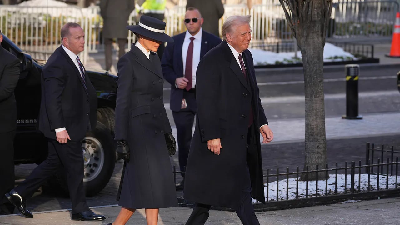 Melania Trump opts for a navy coat and hat during her Inauguration Day church visit.