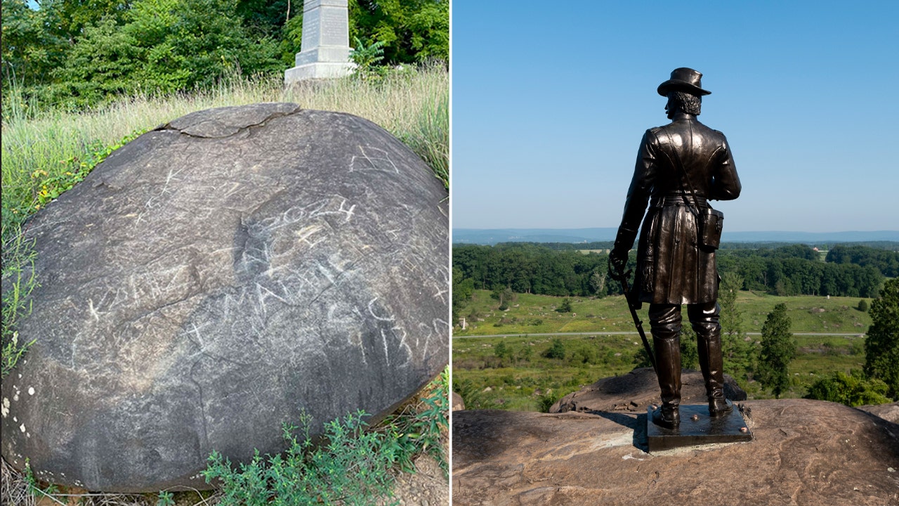 Preservationists remove traces of vandalism at Gettysburg battleground, protecting 'hallowed ground'.