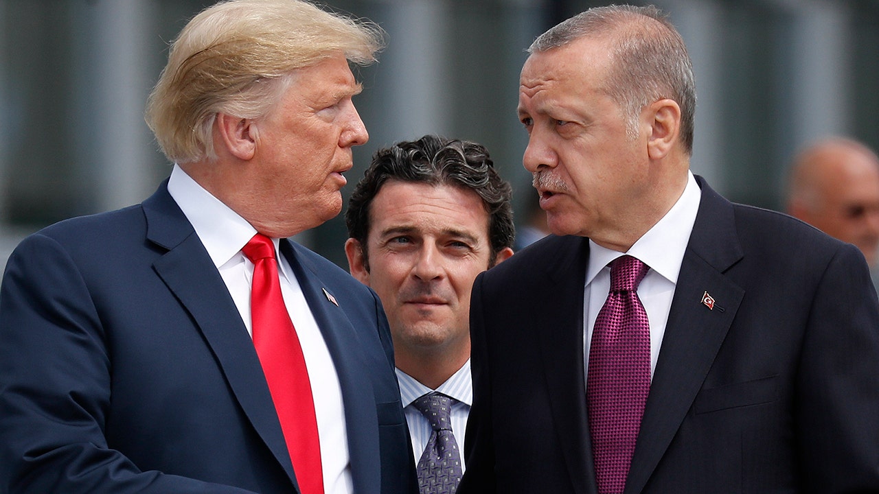 Trump accuses Turkey of an unfriendly takeover in Syria as US-brokered cease-fire seems to falter.