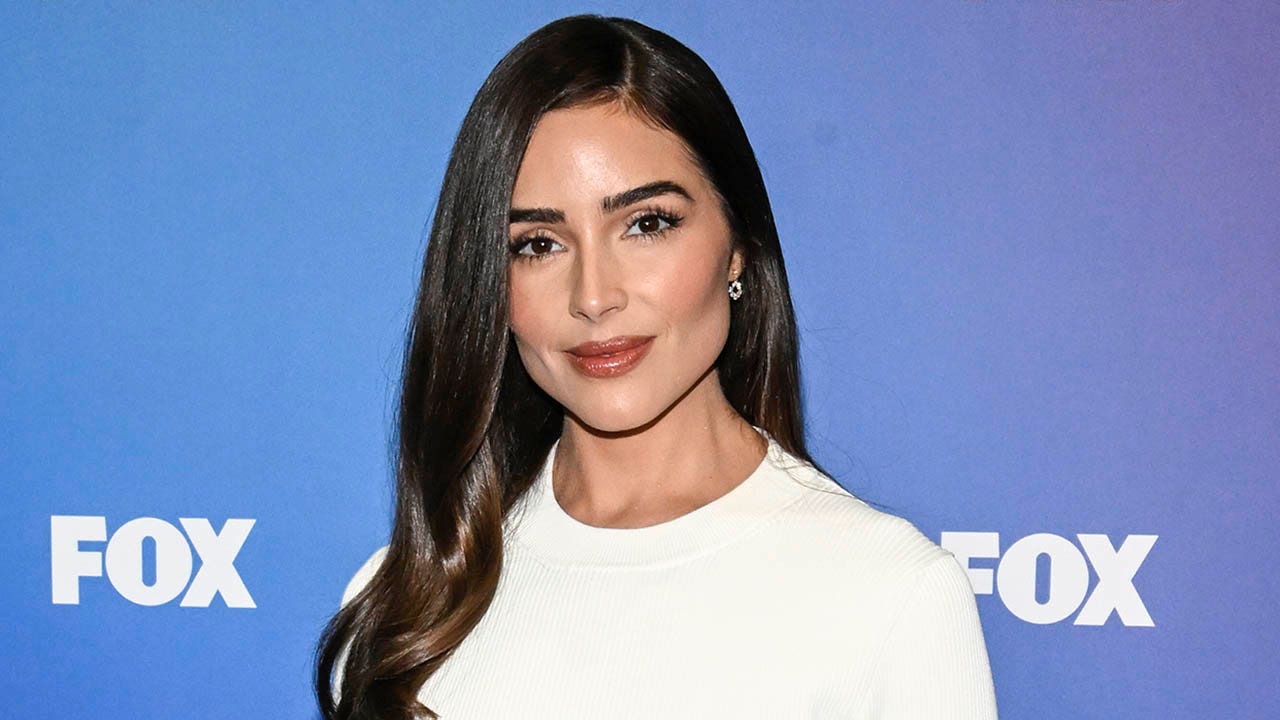 Olivia Culpo defends her wedding dress choice amidst criticism.