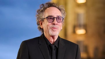 Tim Burton, director of 'Beetlejuice,' expresses concern about AI and the unsettling sensation it evokes.