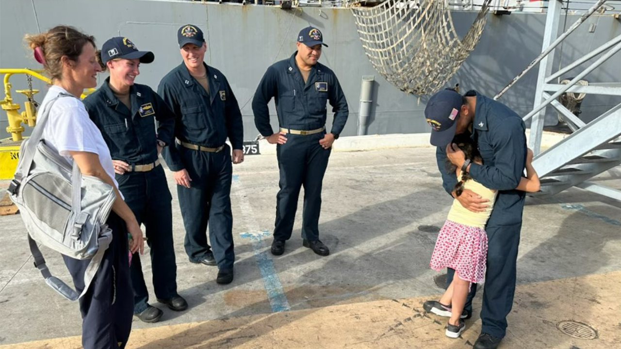 Rescued from a sailboat offshore Hawaii were a woman, a child, a tortoise, and a cat.