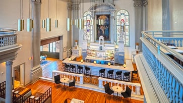 A former school chapel in Maryland now houses a hotel bar, prompting criticism from some who want it relocated.