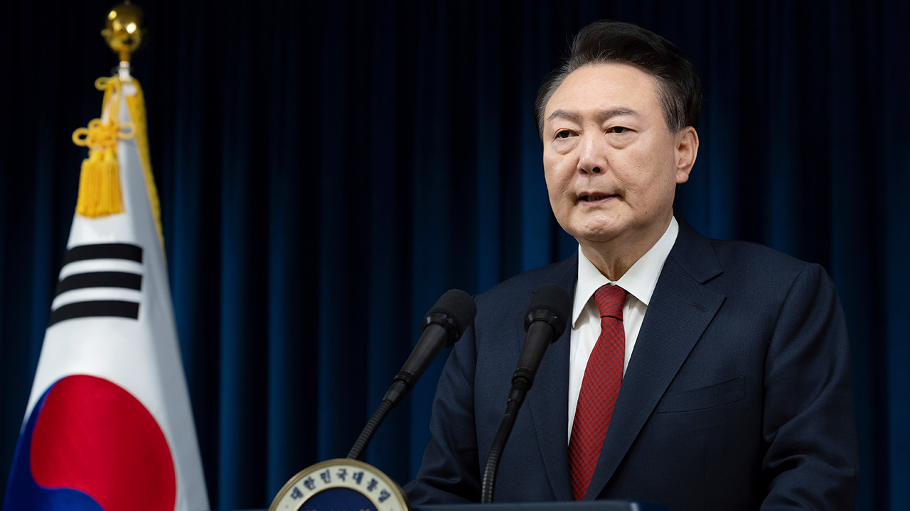 President Yoon faces travel restrictions due to South Korea's martial law declaration.