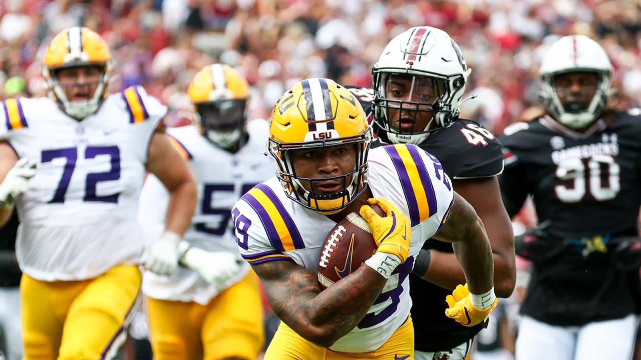 LSU escapes an upset by a hair's breadth, as South Carolina fails to convert a last-second field goal.