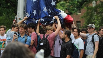 Anti-Israel mob attacked American flag, UNC fraternity brothers defended it, hailed as 'beacon of hope'.