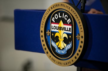 During a traffic stop, two Kentucky police officers were shot while investigating a reported stolen car.