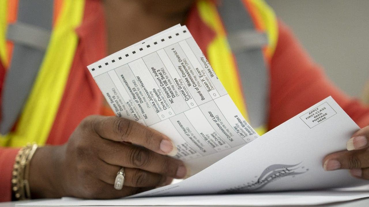 Over 747,000 individuals are removed from North Carolina's voter rolls.