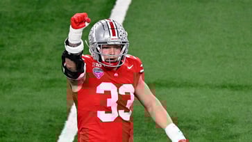 The Buckeyes' late scoop-and-score propels them to a national title victory over Texas.