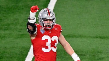 The Buckeyes' late scoop-and-score propels them to a national title victory over Texas.