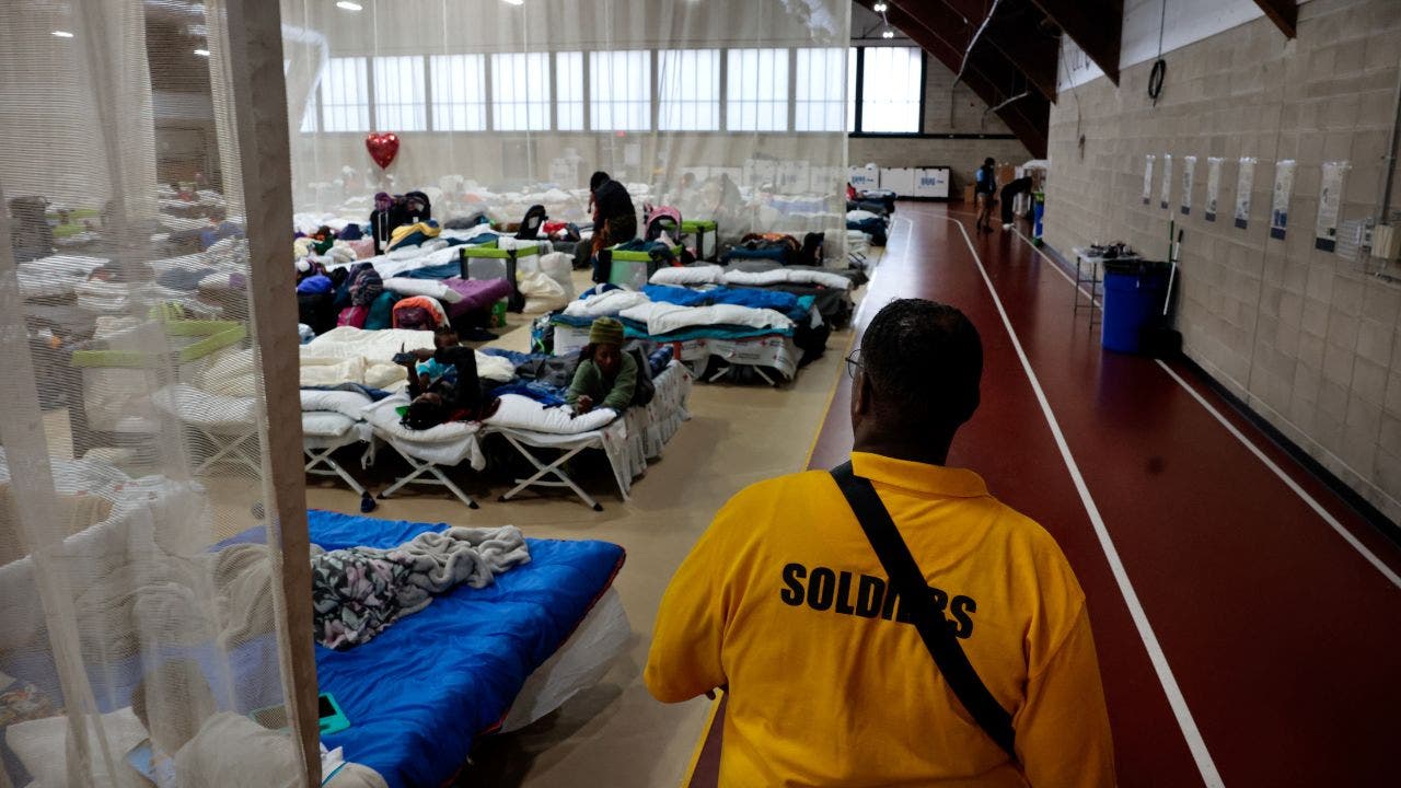 Former director claims that Massachusetts migrants are using taxpayer-funded shelter beds without proper vetting.