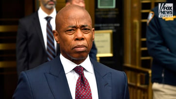 NYC Mayor Eric Adams vows to remain in office during two church speeches.